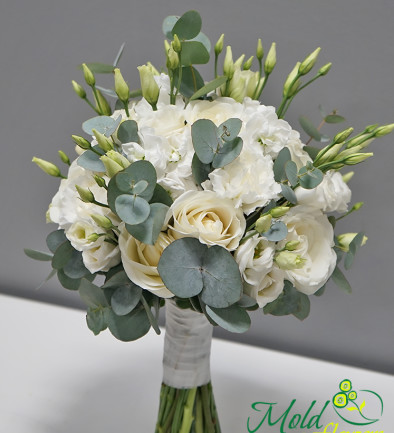 Bridal bouquet of white spray rose, white rose, eustoma, white dianthus, mathiola, hypericum, and eucalyptus photo 394x433